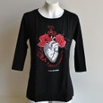 Camiseta de señora "Anatomía del corazón; ...Y tenía corazón" de Enrique Simonet Lombardo | XL | NEGRA Portada de: Camiseta de señora "Anatomía del corazón; ...Y tenía corazón" de Enrique Simonet Lombardo | XL | NEGRA